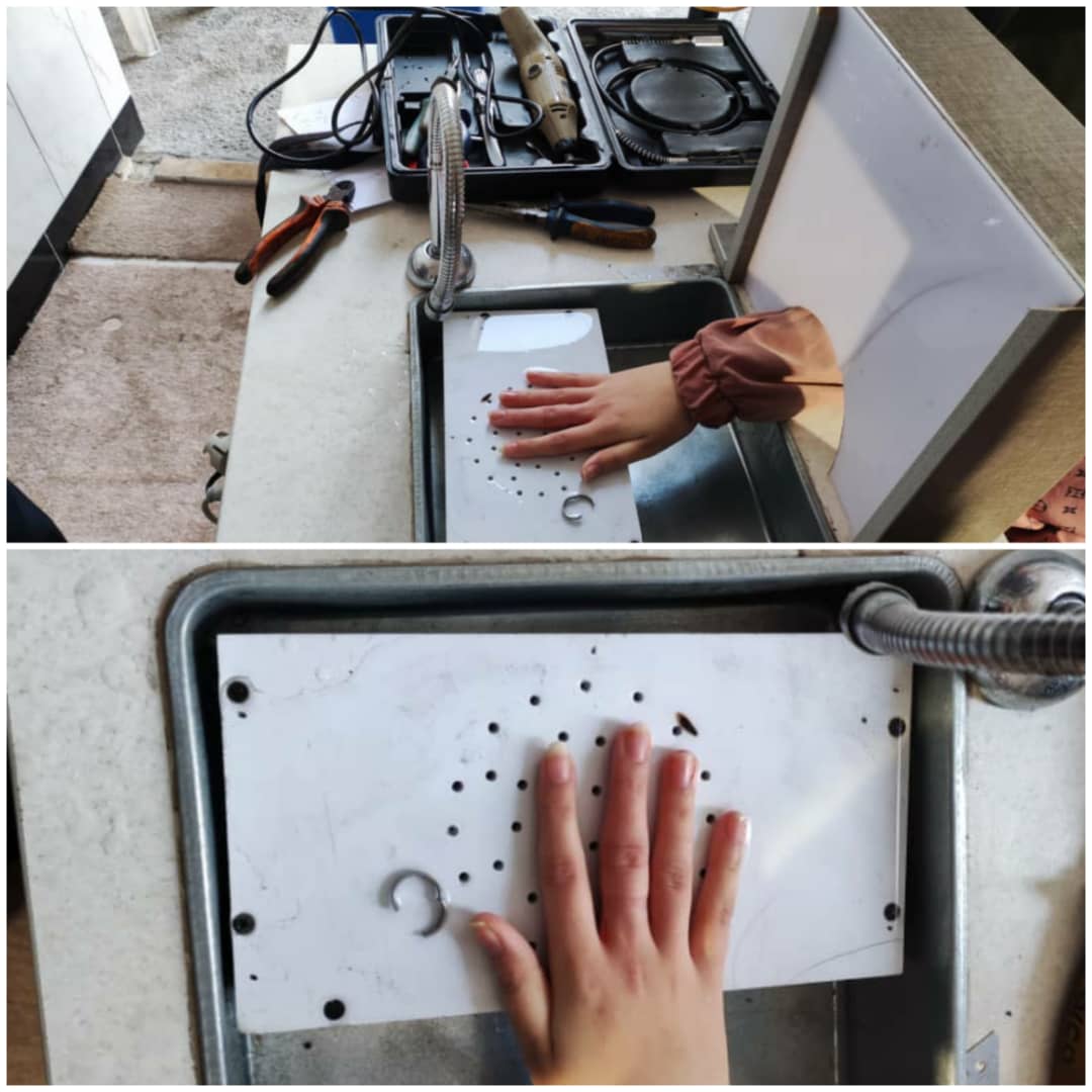 خارج کردن حلقه انگشتر  از انگشت دست شهروند بابلی